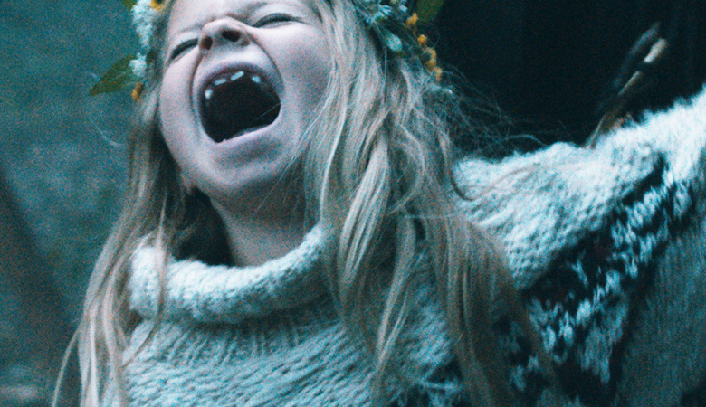 A still of the film Pelican Blood showing the screaming protagonist Raya. The title says "Pelican Blood. Now available on DVD, Blu-Ray and VOD."